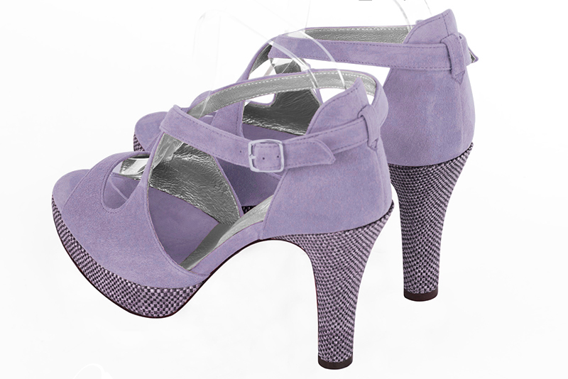 Lilac purple women's closed back sandals, with crossed straps. Round toe. Very high slim heel with a platform at the front. Rear view - Florence KOOIJMAN